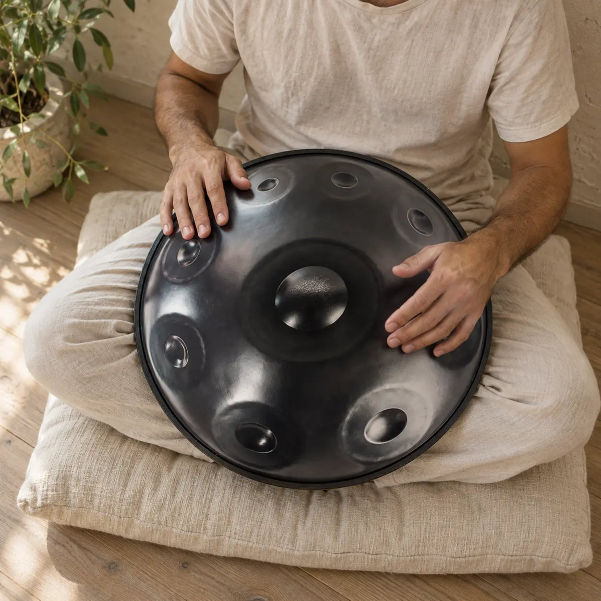 Handpan artisanal acier détail ding central résonance profonde